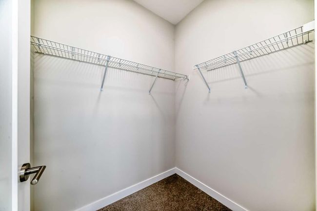 214 Shawnee Square Sw, Townhouse with 2 bedrooms, 3 bathrooms and 3 parking in Calgary AB | Image 38
