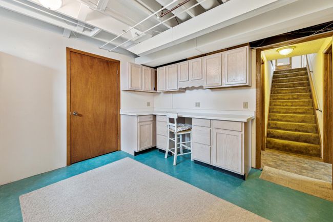 Lower level laundry room with ample storage | Image 19