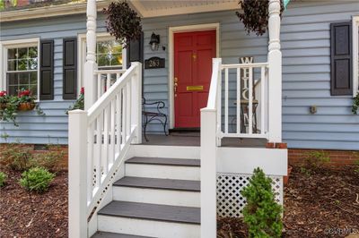 Doorway to property featuring covered porch | Image 2