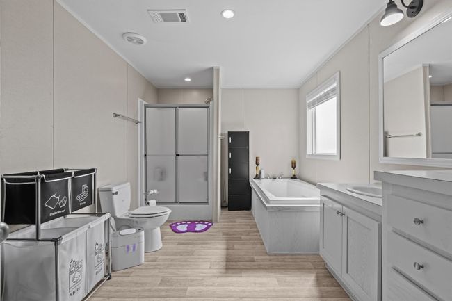 The centerpiece is a spacious 2, 061 sq ft manufactured home, just 1.5 years old, with 4 bedrooms, 2 bathrooms, and a beautifully crafted 40' x 20' stone outdoor kitchen under a covered roof with lighting—ideal for hosting under the stars. | Image 12