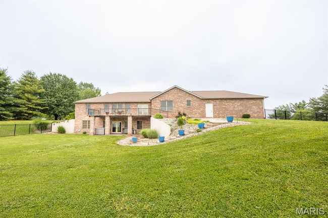 Rear view of house featuring brick siding | Image 41