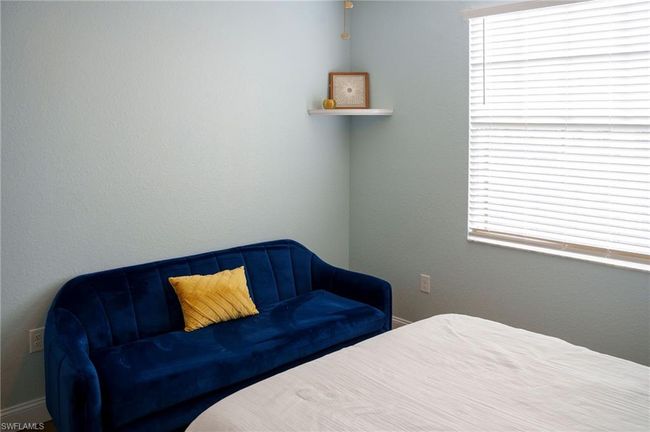 Bedroom with baseboards | Image 23