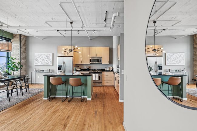 Exposed ductwork and beautifully refinished original hardwood floors!.jpg | Image 12