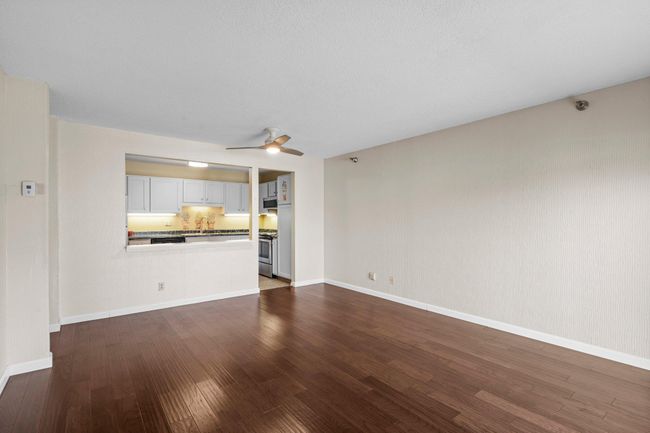Living room with newer wood floors | Image 25