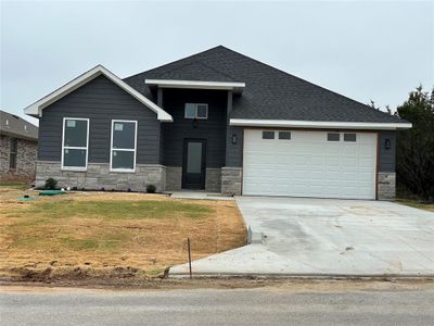 View of front of home with a garage | Image 1