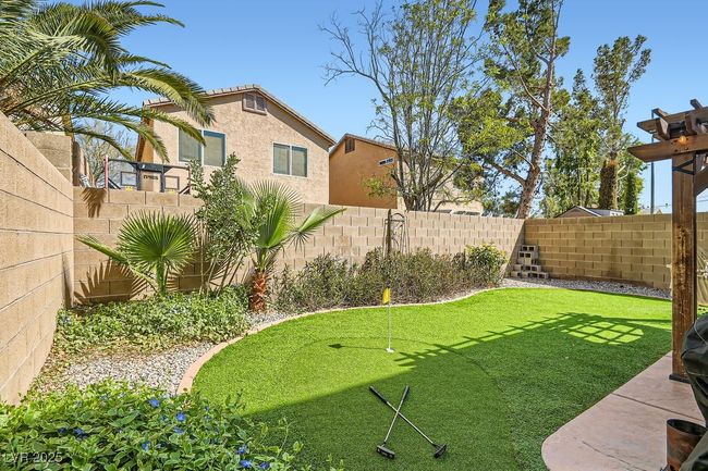 View of yard featuring a fenced backyard | Image 18
