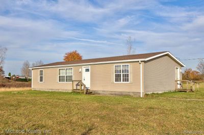 7515 Center Road, Home with 3 bedrooms, 2 bathrooms and null parking in Watertown Twp MI | Image 1