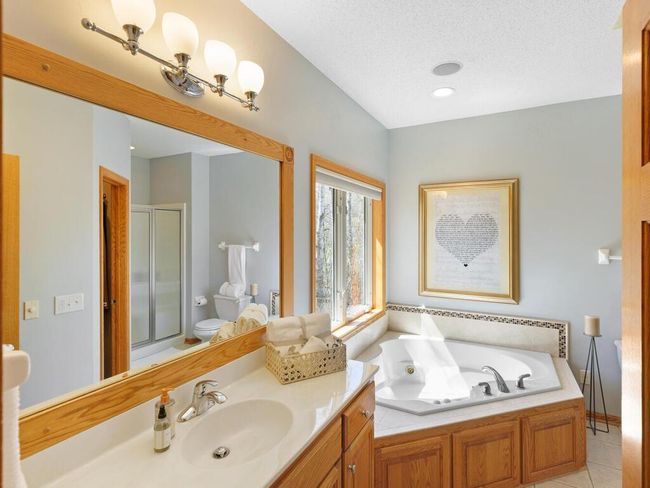 Private primary bath with separate jacuzzi tub - 25259 Galaxy Ave Wyoming MN 55092 USA-049-133-050-MLS_Size.jpg | Image 26