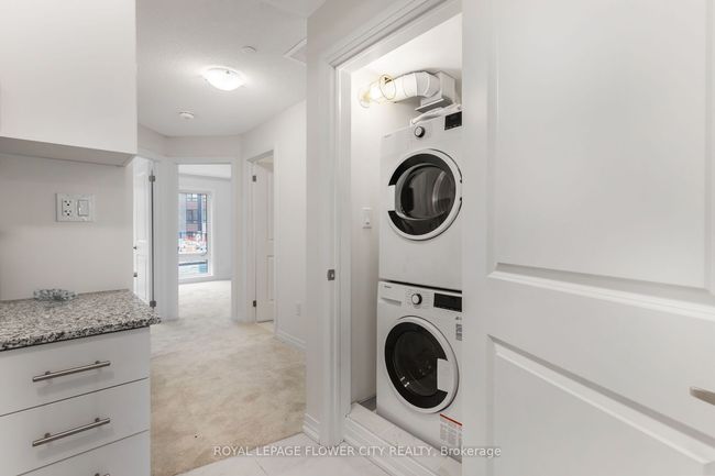 2 - 155 Tapscott Rd, Condo with 2 bedrooms, 1 bathrooms and null parking in Toronto ON | Image 24