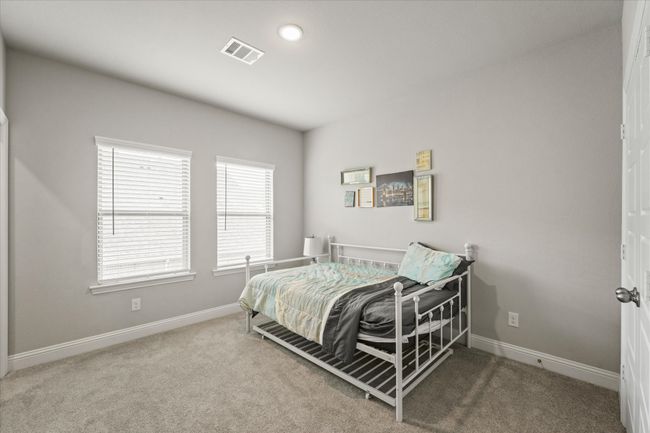 Carpeted bedroom featuring baseboards and recessed lighting | Image 16