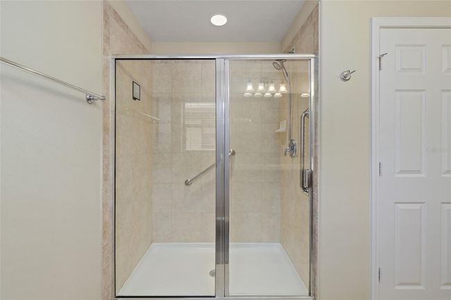Walk in shower located in the Primary Bedroom | Image 13