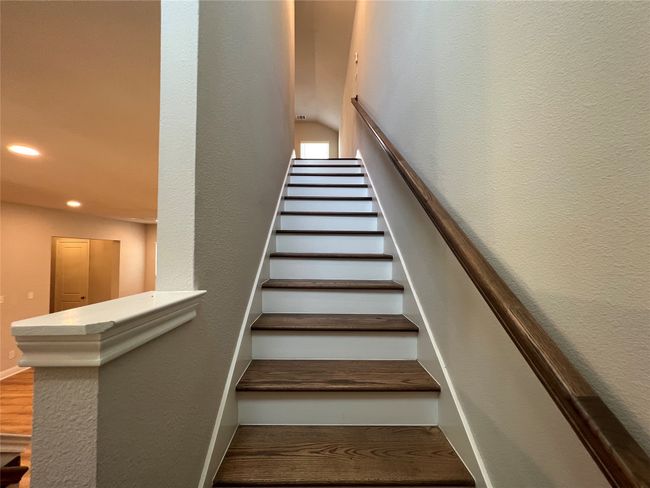 Stairs featuring recessed lighting and wood finished floors | Image 13