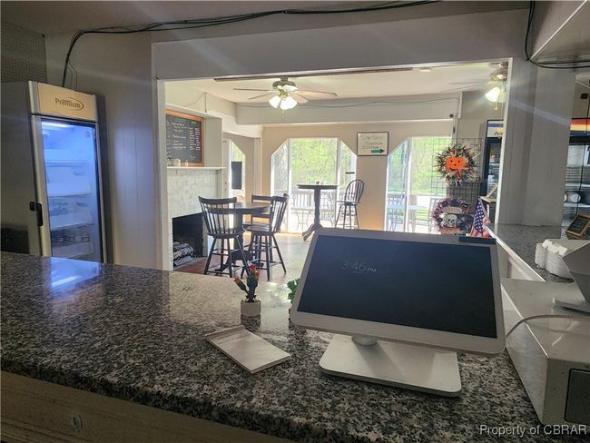 Serving counter facing main entrance. | Image 12