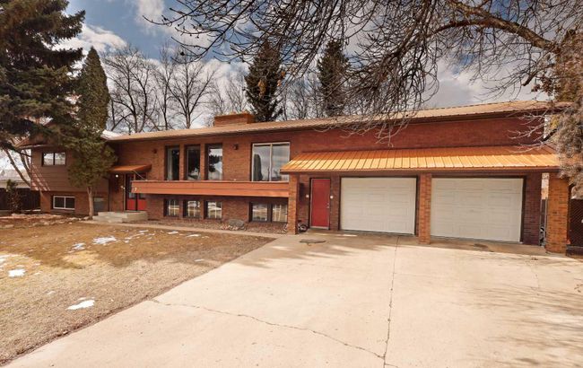 7 Douglas Court W, Home with 5 bedrooms, 3 bathrooms and 2 parking in Brooks AB | Image 2