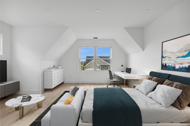 Bedroom featuring lofted ceiling, baseboards, and light wood-type flooring | Image 20
