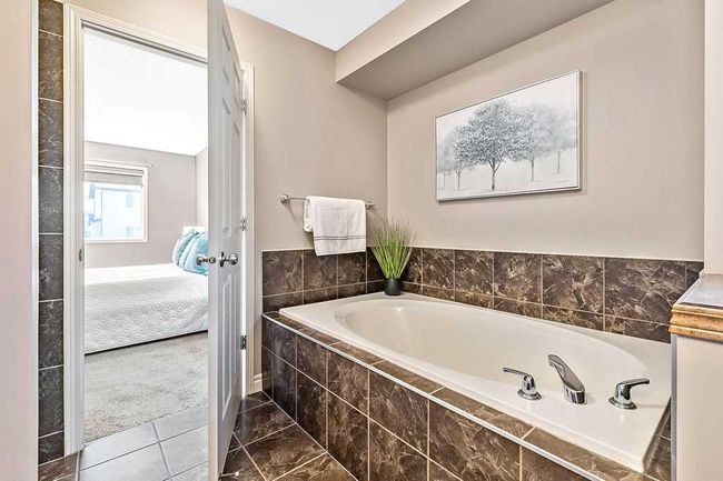 419 Cimarron Blvd, House other with 3 bedrooms, 3 bathrooms and 4 parking in Okotoks AB | Image 34