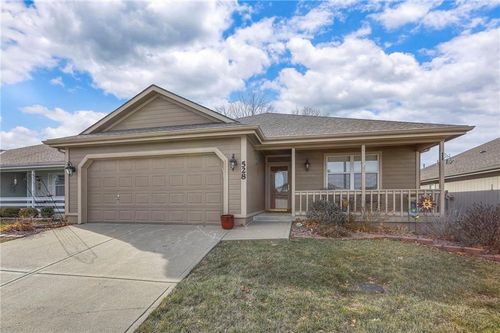 528 Saturn Dr, Raymore, MO, 64083-8803 | Card Image