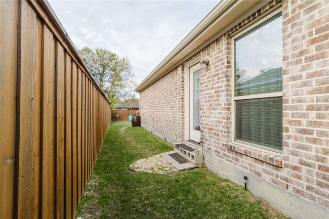 View of property exterior featuring a yard | Image 20