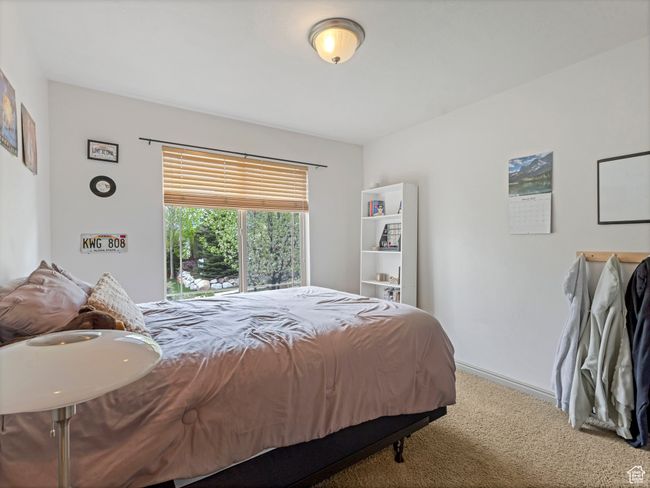 Bedroom featuring carpet floors | Image 23