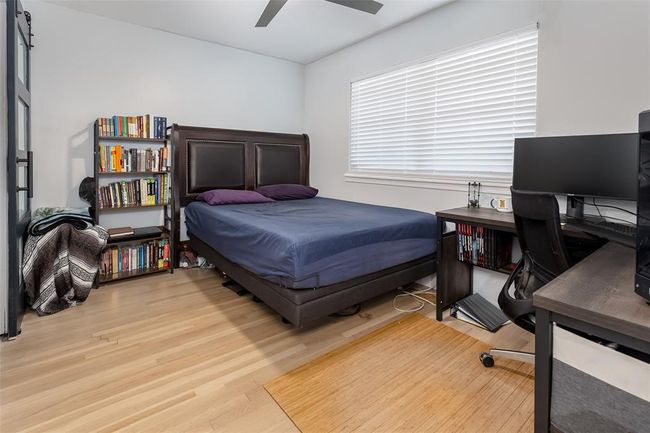 Bedroom featuring ceiling fan and light hardwood / wood-style flooring | Image 14
