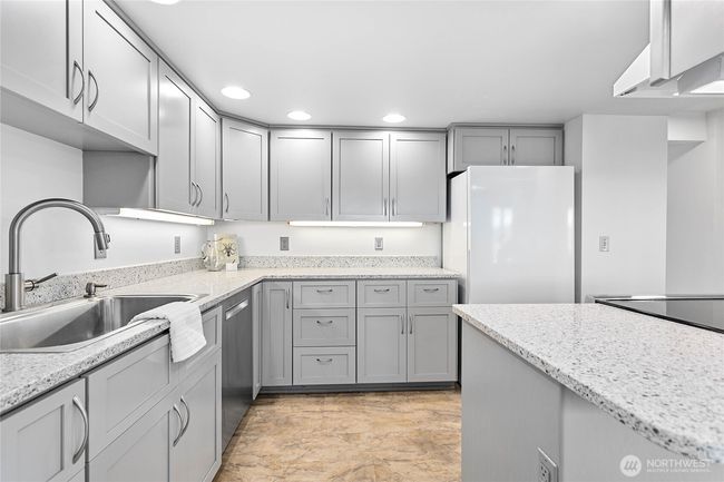 Under cabinet lighting and lots of counter space. | Image 14