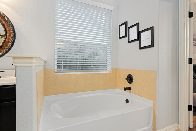 Full bath with vanity and a bath | Image 20