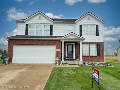 7391 Deer Creek Drive, Home with 4 bedrooms, 2 bathrooms and null parking in Clayton Twp MI | Image 1