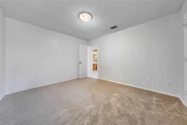 Spare room with light carpet | Image 19