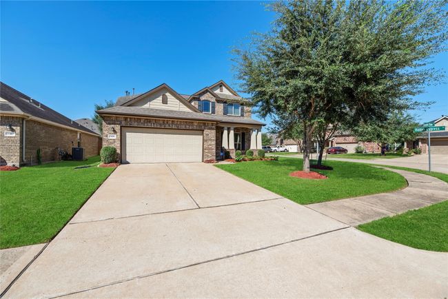 Outfitted with a security system, you can rest easy knowing your family and those you love are protected. | Image 35