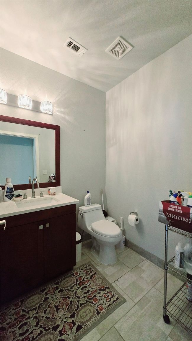 Half bath with toilet and vanity | Image 6