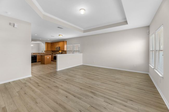 An additional view of your family room that flows seamlessly from your kitchen, is perfect for entertaining! | Image 14