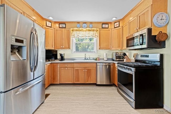 Brand new vinly flooring (April, 2025) with all appliances that convey. | Image 6