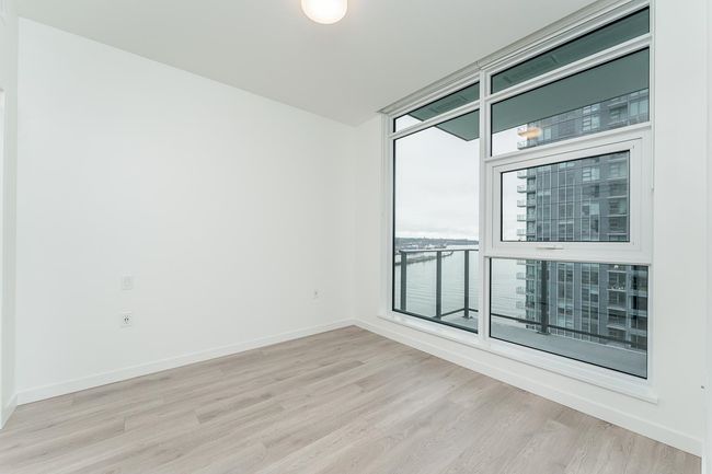 Unfurnished room featuring light wood finished floors and baseboards | Image 15