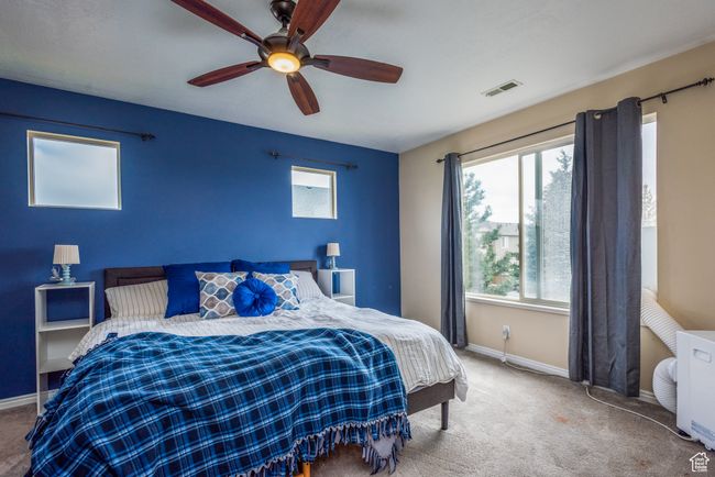 Bedroom featuring baseboards, carpet floors, and a ceiling fan | Image 16