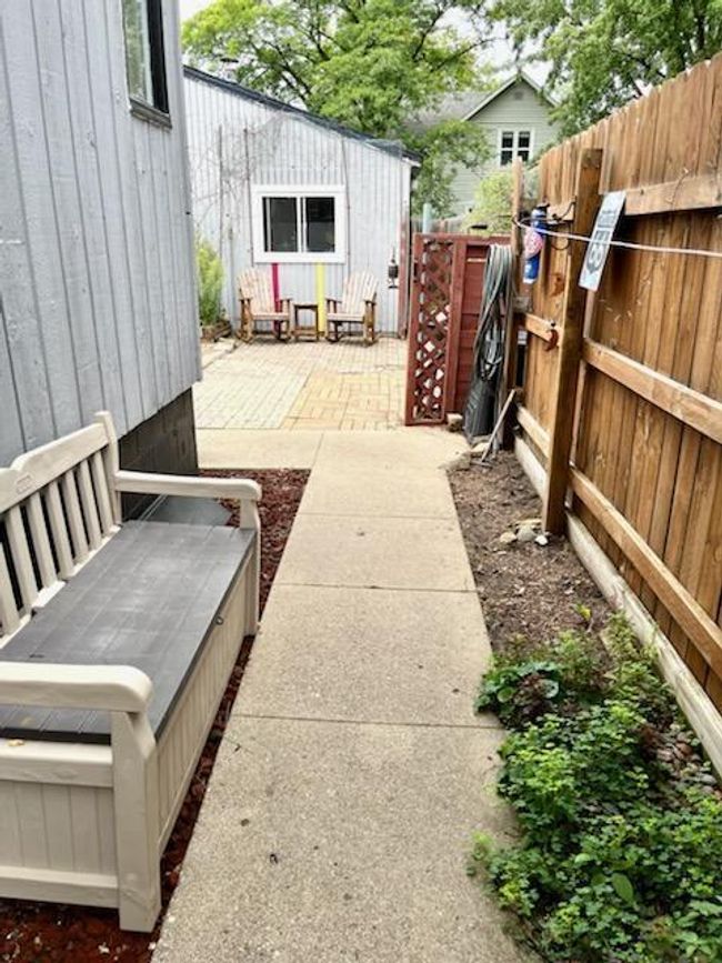 Walkway from the side door to the backyard. | Image 23