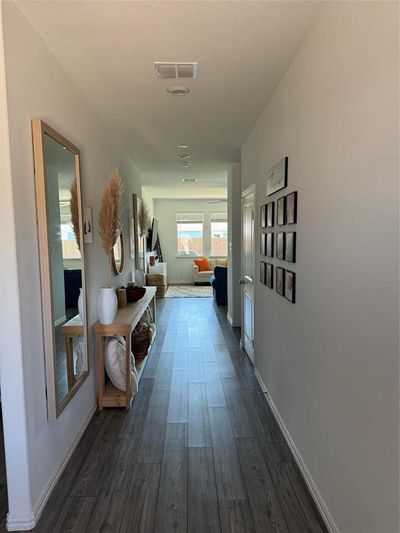 Hallway featuring dark hardwood / wood-style flooring | Image 2