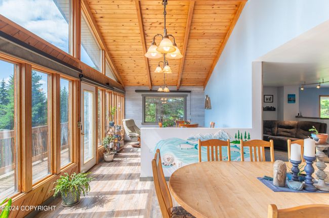 Dining opens into sun room | Image 30