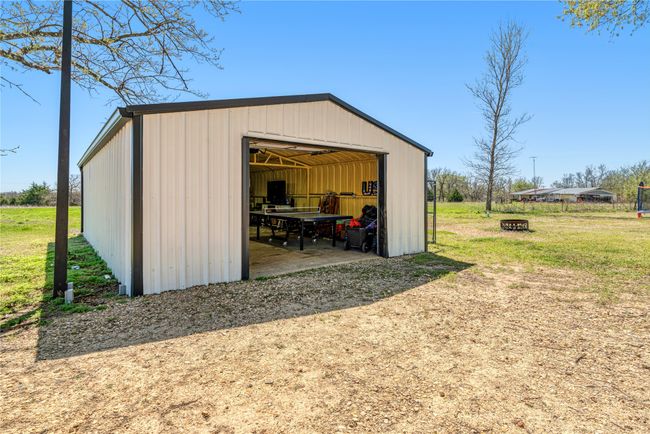View of pole building with a yard | Image 19