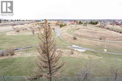 6207-304 Mackenzie Way Sw, Airdrie, AB, T4B3H6 | Card Image