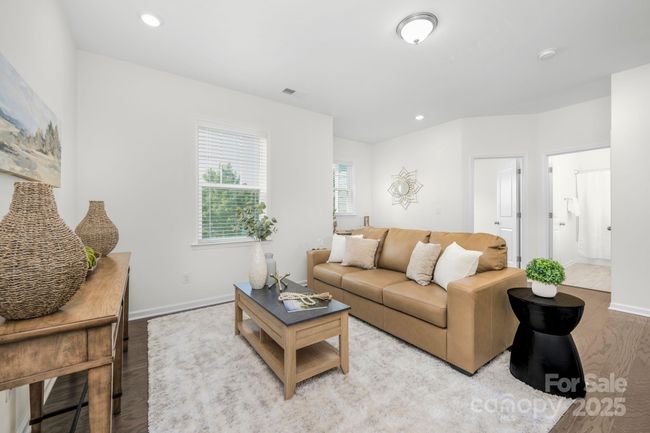Main area with views of the niche where the desk is placed, entry to BR #1, a guest bath and a large closet | Image 17