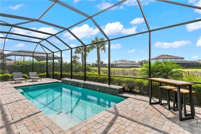 17623 Kinzie Ln, House other with 4 bedrooms, 3 bathrooms and null parking in Estero FL | Image 2