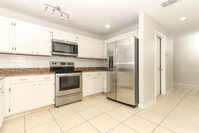 3075 Tall Timber Dr, House other with 4 bedrooms, 3 bathrooms and null parking in Orlando FL | Image 9
