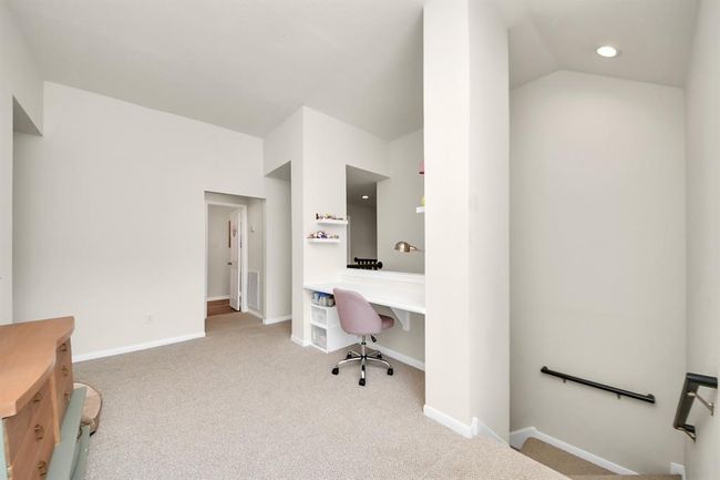 Here’s another view of the versatile flex space upstairs. | Image 25