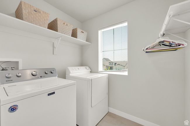 Washroom featuring separate washer and dryer and baseboards | Image 15
