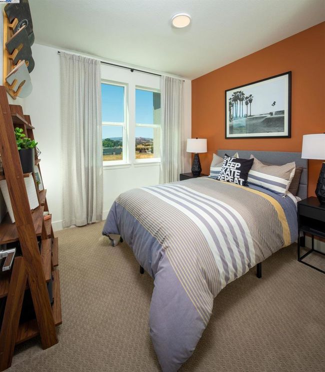 Photo is of the model home and not the actual home for sale. | Image 15