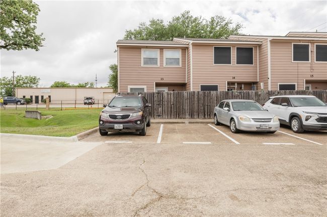 View of front facade with uncovered parking | Image 16