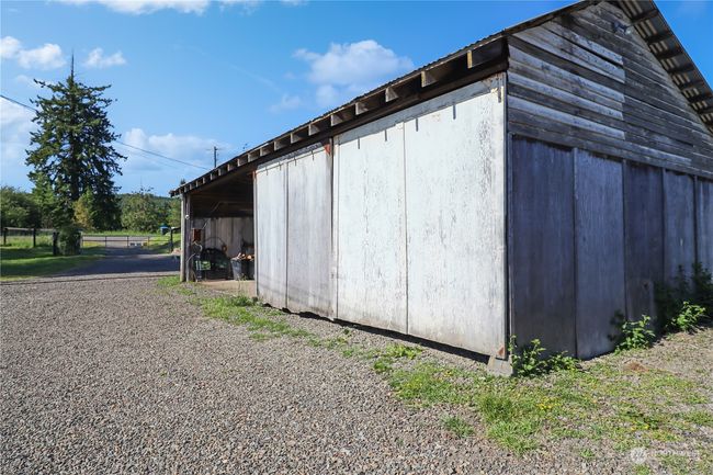 Garage / machine storage building, The area around the buildings has had grading and gravel added to make it function all year long. | Image 36