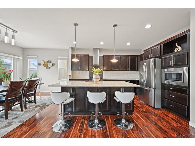 10934 Touchstone Loop, House other with 4 bedrooms, 4 bathrooms and null parking in Parker CO | Image 10