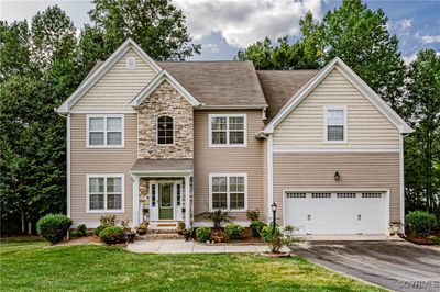 Elegant Front Elevation with Stone Accent | Image 3