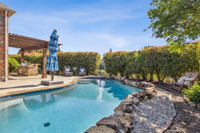 View of pool featuring a patio and a pergola | Image 31